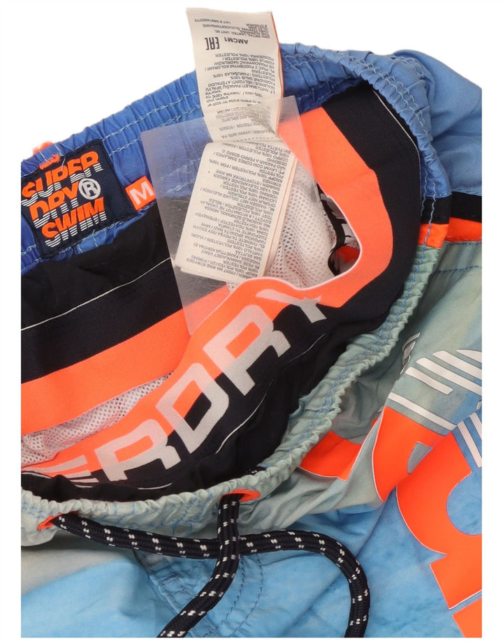 Shorts de natação masculino Superdry gráfico listrado azul médio poliéster