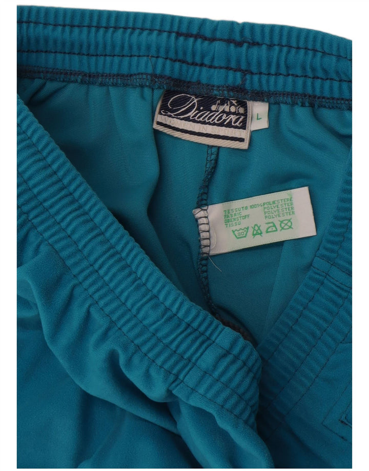 Calça de treino masculina Diadora grande poliéster azul