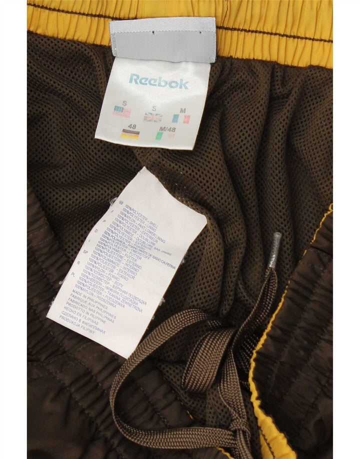 Reebok Mens Graphic Calças de treino Joggers Pequeno Poliéster Marrom