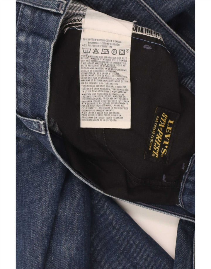 Calça jeans reta masculina Levi's desgastada W33 L34 azul algodão