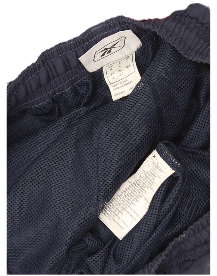 Reebok Mens Graphic Tracksuit Calças Joggers Médio Azul Marinho Colourblock