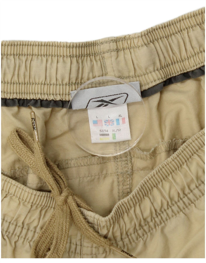 Calça de treino masculina REEBOK Graphic grande bege nylon