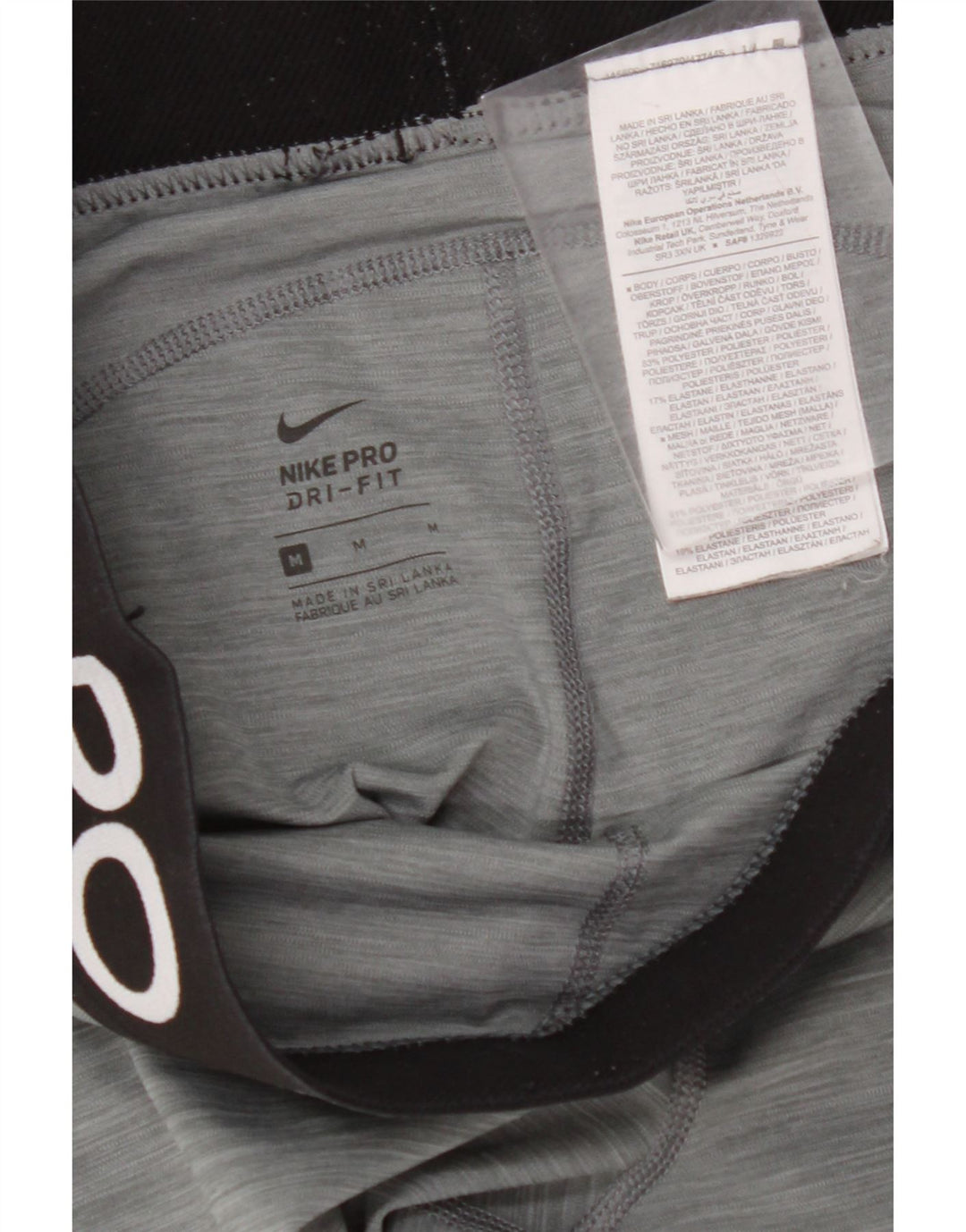 Leggings femininas Nike Dri Fit Graphic UK 12 poliéster cinza médio
