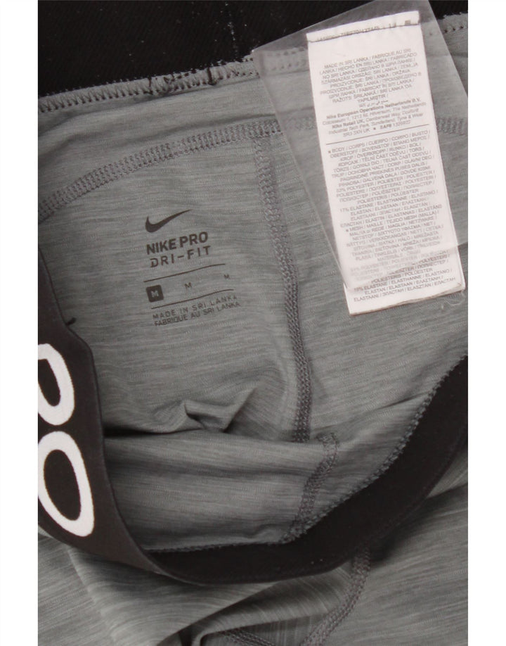 Leggings femininas Nike Dri Fit Graphic UK 12 poliéster cinza médio