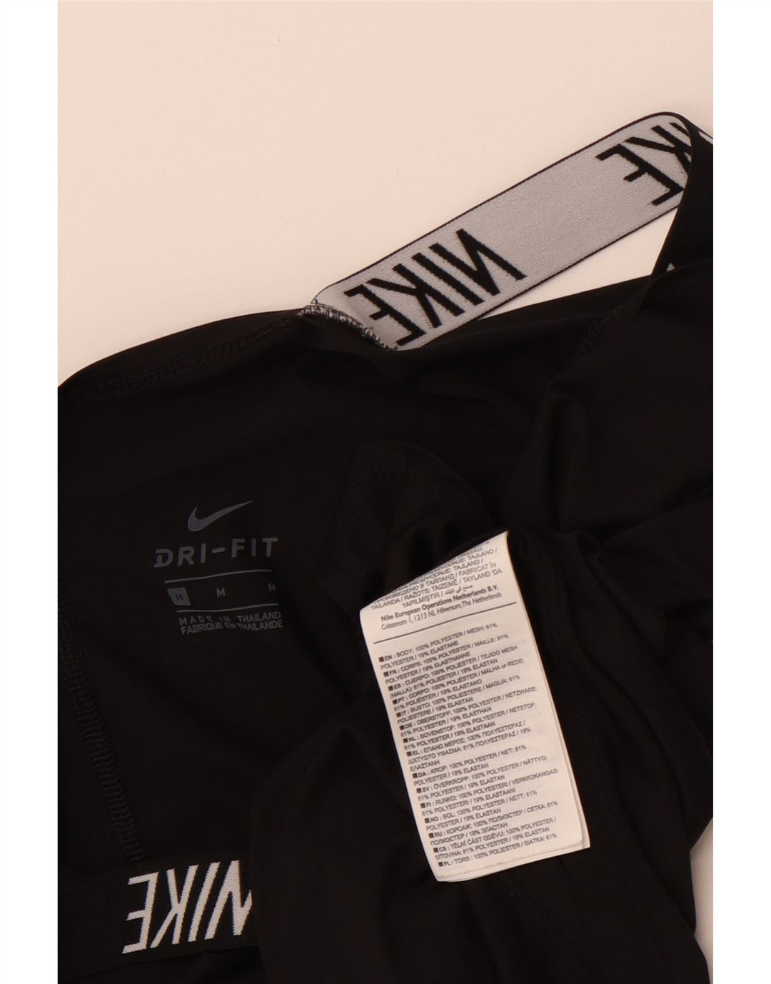 Colete feminino Nike Dri Fit Loose Fit gráfico top UK 12 médio preto