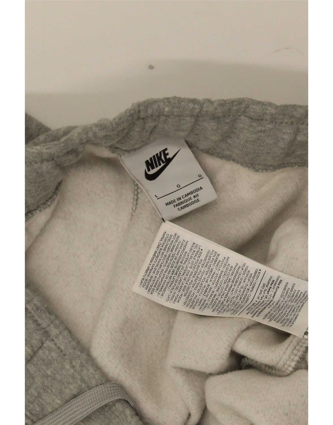 Calça esportiva Nike masculina gráfica cargo grande cinza manchada