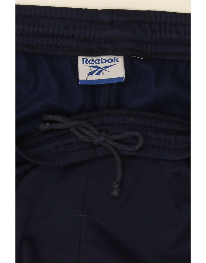 Calça de treino masculina Reebok grande bloco colorido azul marinho
