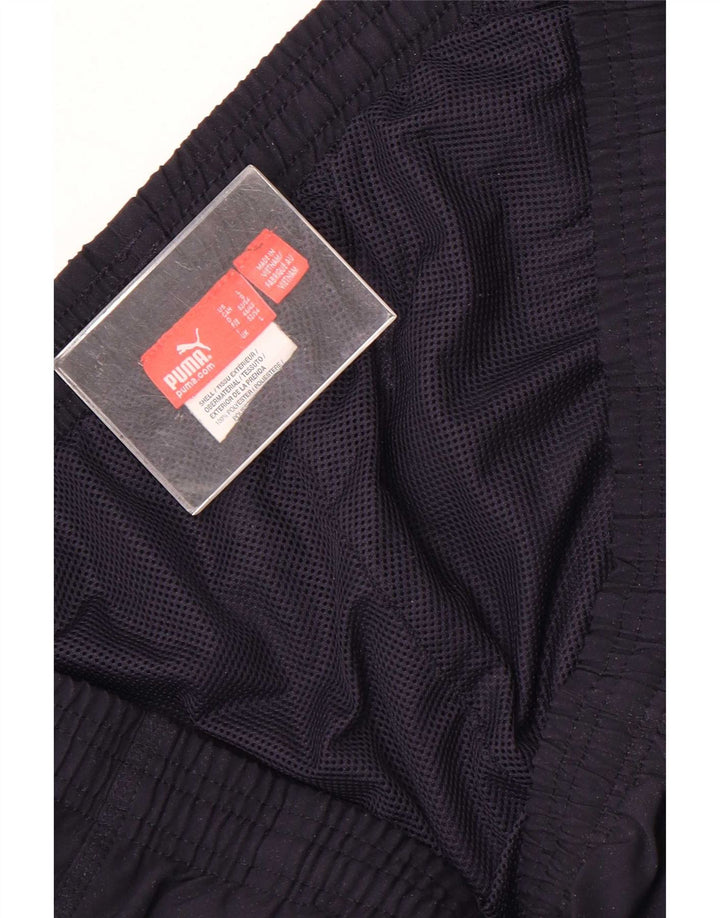 Calça de treino masculina Puma Graphic grande poliéster azul marinho
