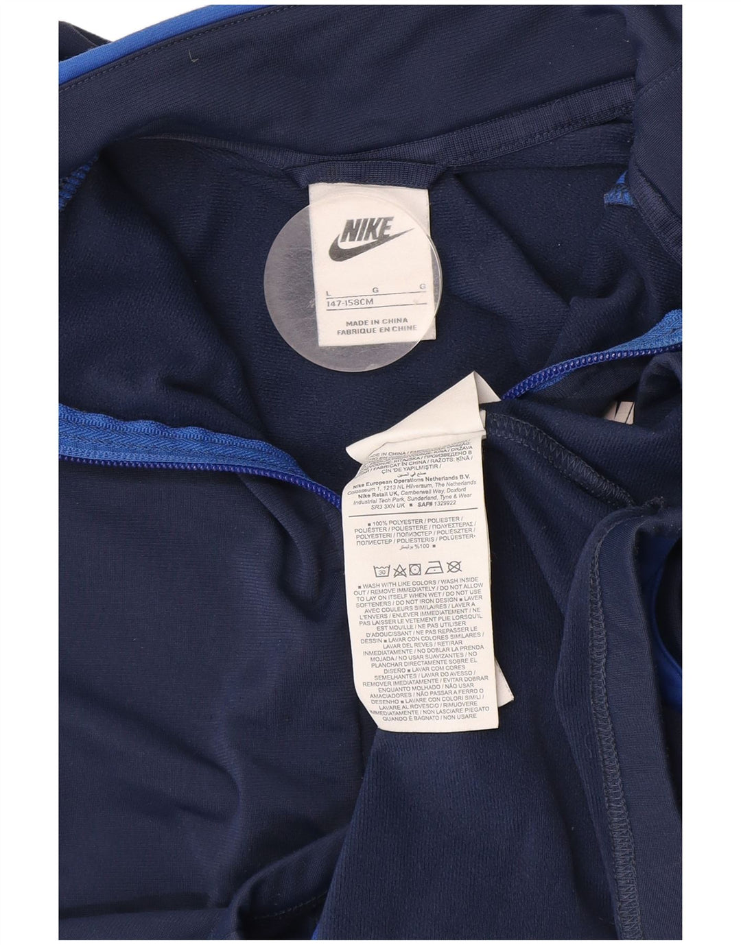 Jaqueta Nike Boys Tracksuit Top 12-13 anos grande azul marinho colorblock