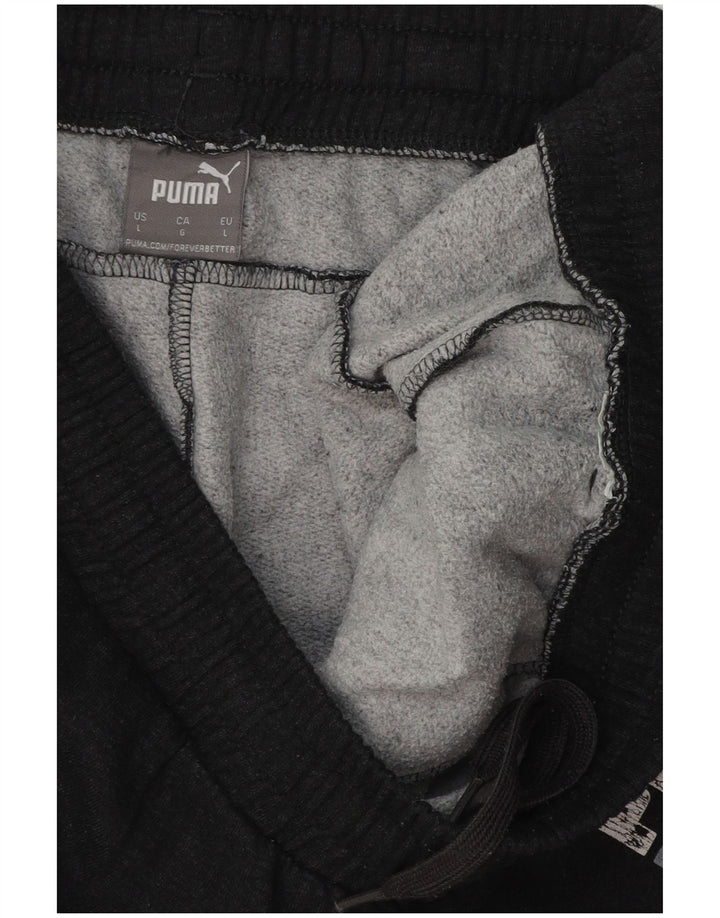 Calça esportiva masculina PUMA Graphic Joggers grande preta