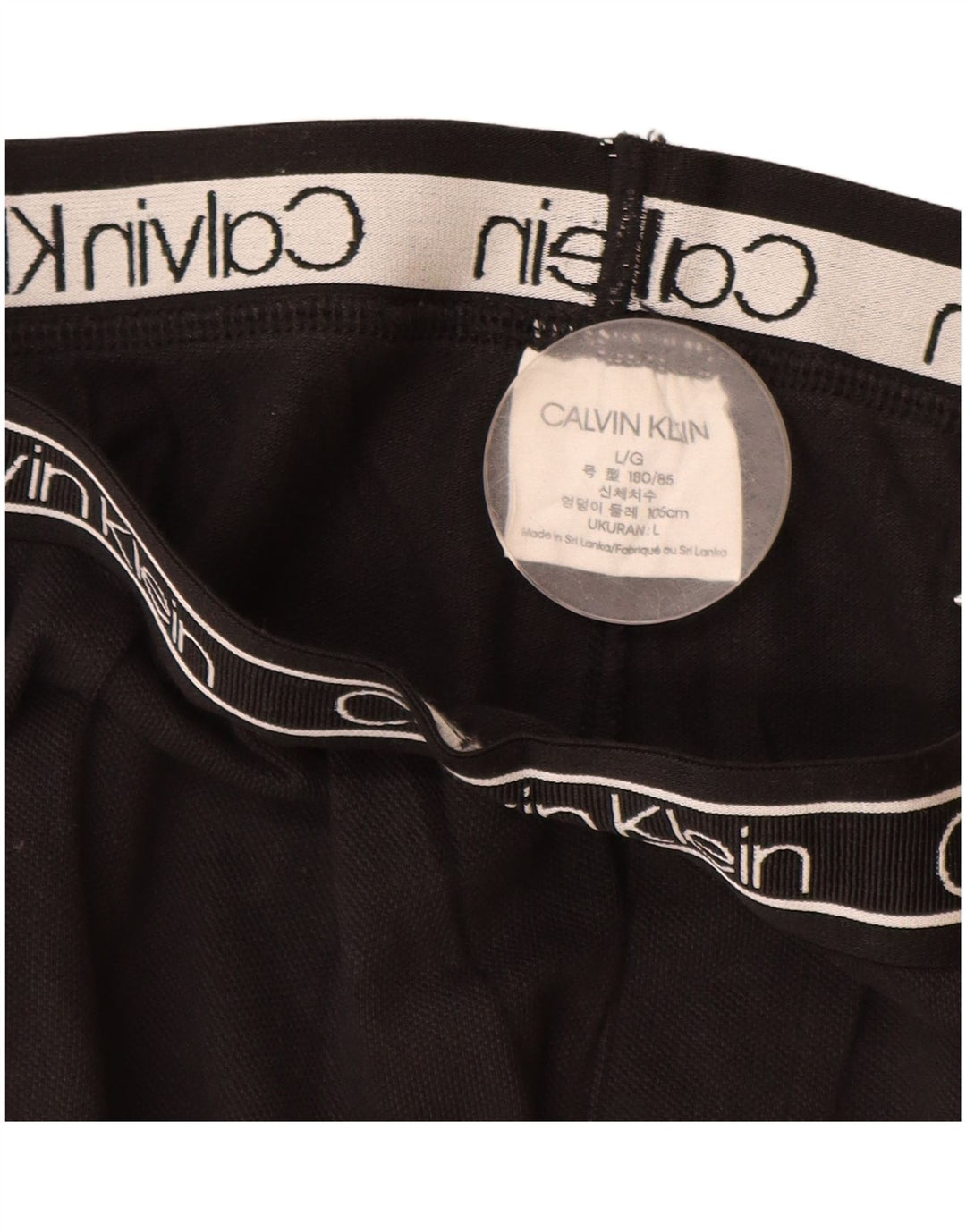 Calça esportiva masculina CALVIN KLEIN com estampa gráfica grande de algodão preto
