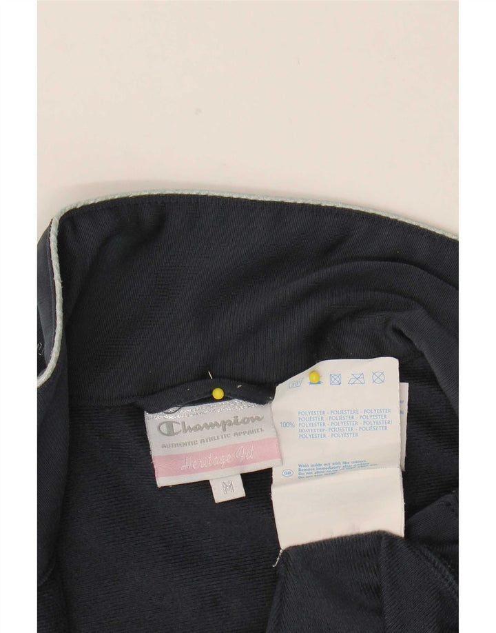 Jaqueta feminina Champion Heritage Fit Tracksuit UK 14 Médio Azul Marinho