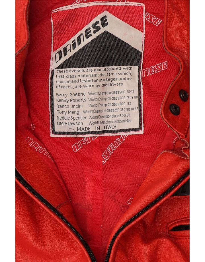 Macacão feminino Dainese para motocicleta com estampa gráfica UK 14 bloco colorido vermelho médio