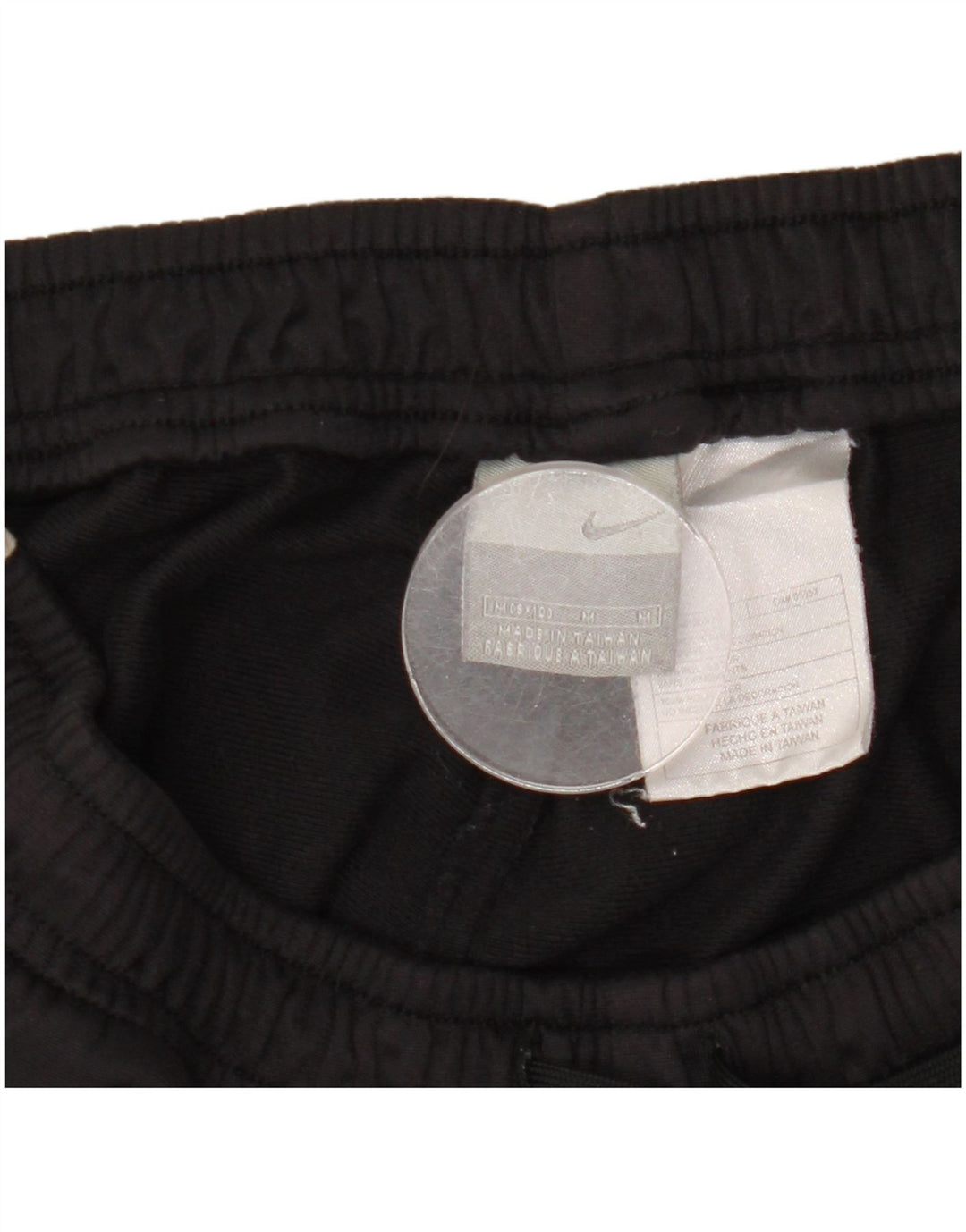 Calça de treino masculina Nike médio preto colorblock poliéster