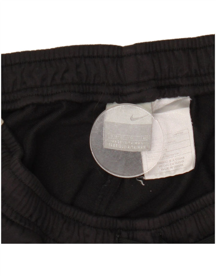 Calça de treino masculina Nike médio preto colorblock poliéster