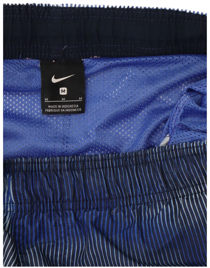 Shorts esportivos masculinos Nike listrado azul médio