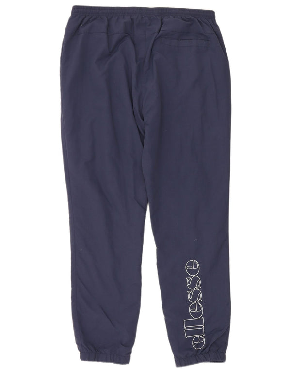 Calça de treino masculina Ellesse com estampa gráfica grande de nylon azul marinho