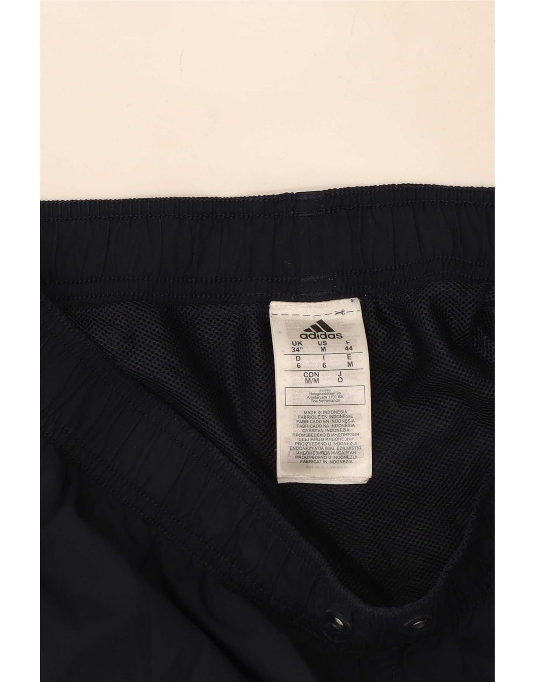 Shorts esportivos masculinos Adidas médio preto poliéster