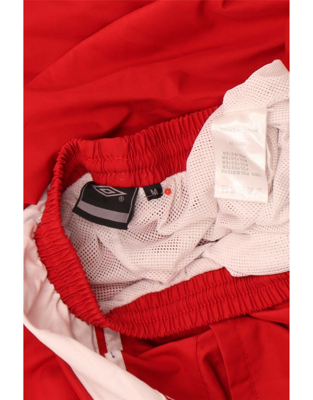 Calça de treino masculina Umbro médio vermelho colorblock poliéster