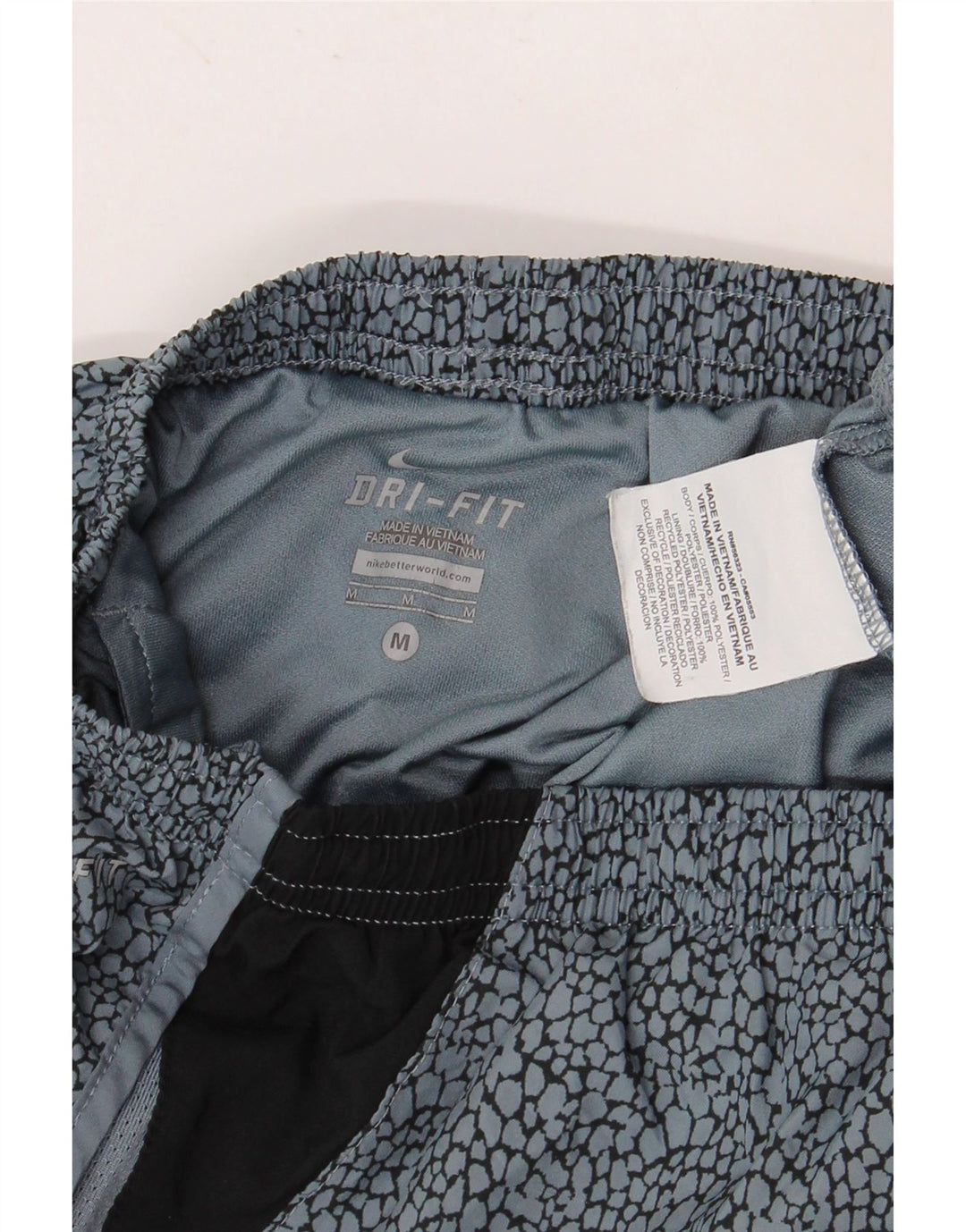 Shorts esportivos femininos NIKE Dri Fit UK 12 médio azul colorblock poliéster