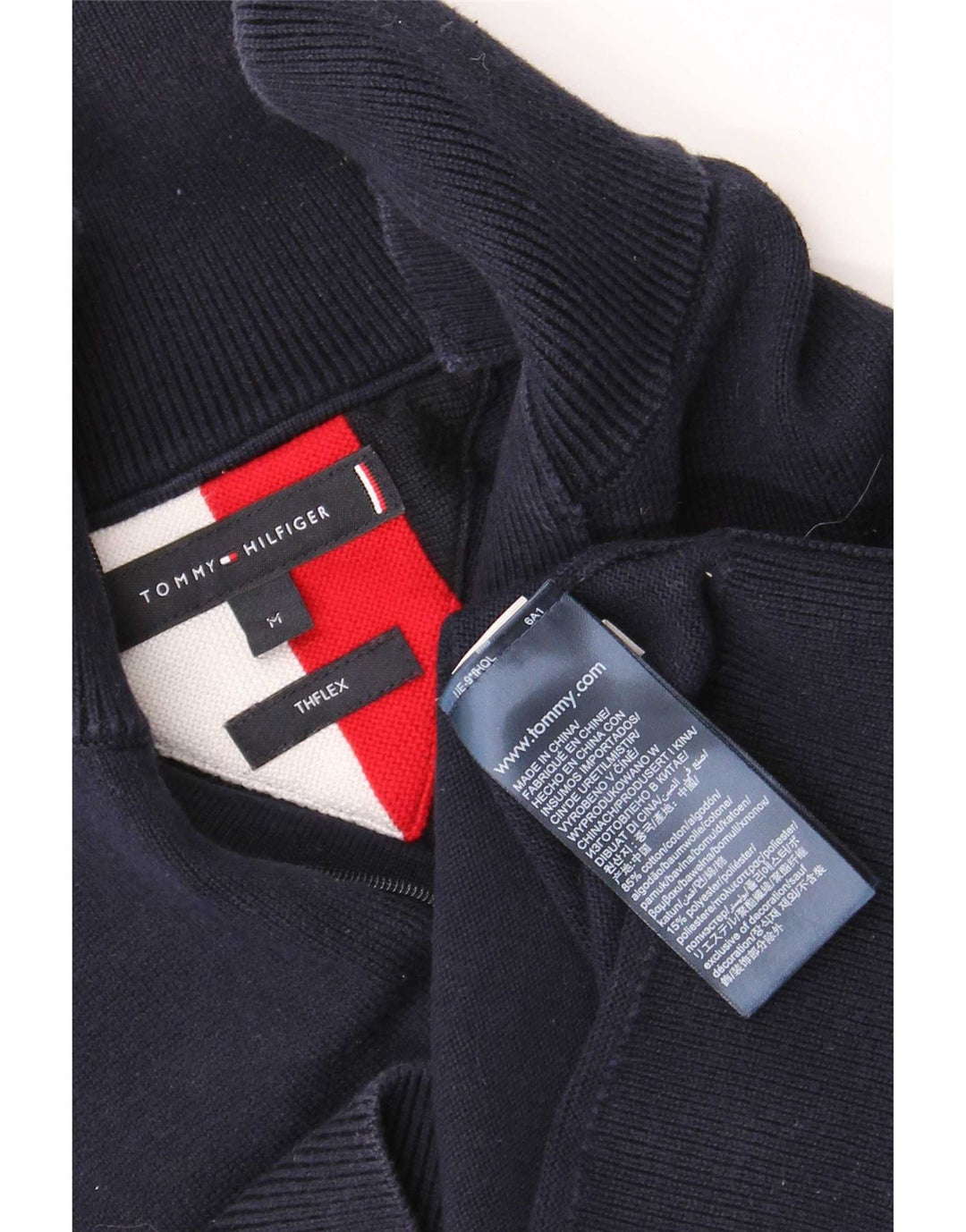 Suéter masculino Tommy Hilfiger com zíper e gola em bloco colorido azul marinho médio