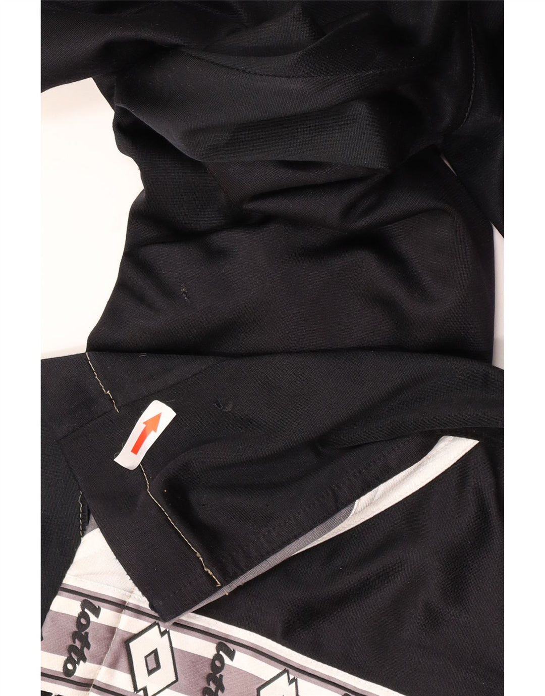 Calça esportiva masculina Lotto com estampa gráfica grande bloco colorido preto