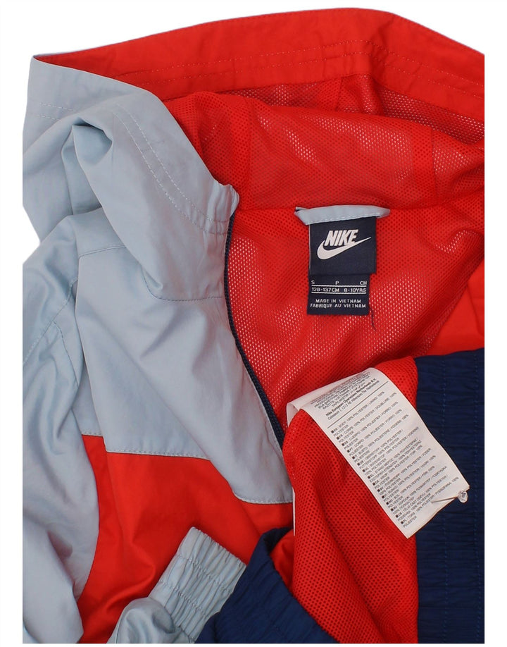 Jaqueta de chuva com capuz Nike Boys 8-9 anos pequena azul marinho Colourblock