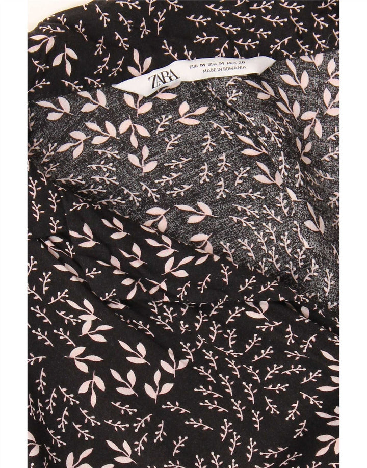 Zara Macacão feminino manga curta médio preto floral