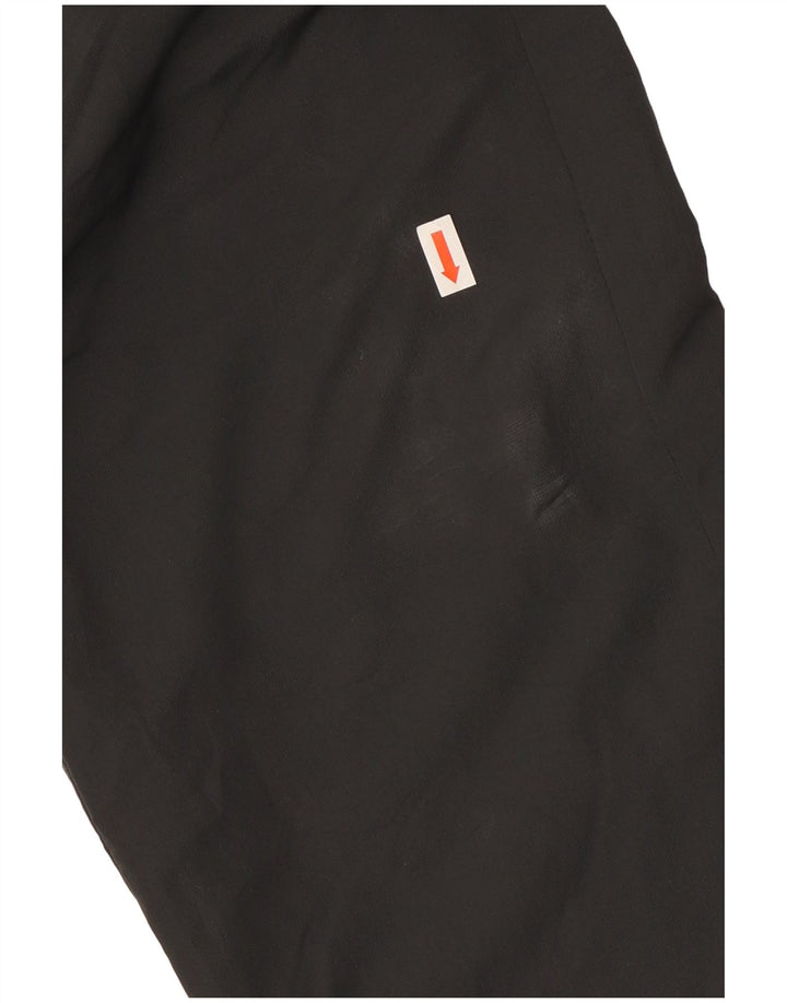 Calça de treino Nike Boys Graphic 10-11 anos médio preto poliéster