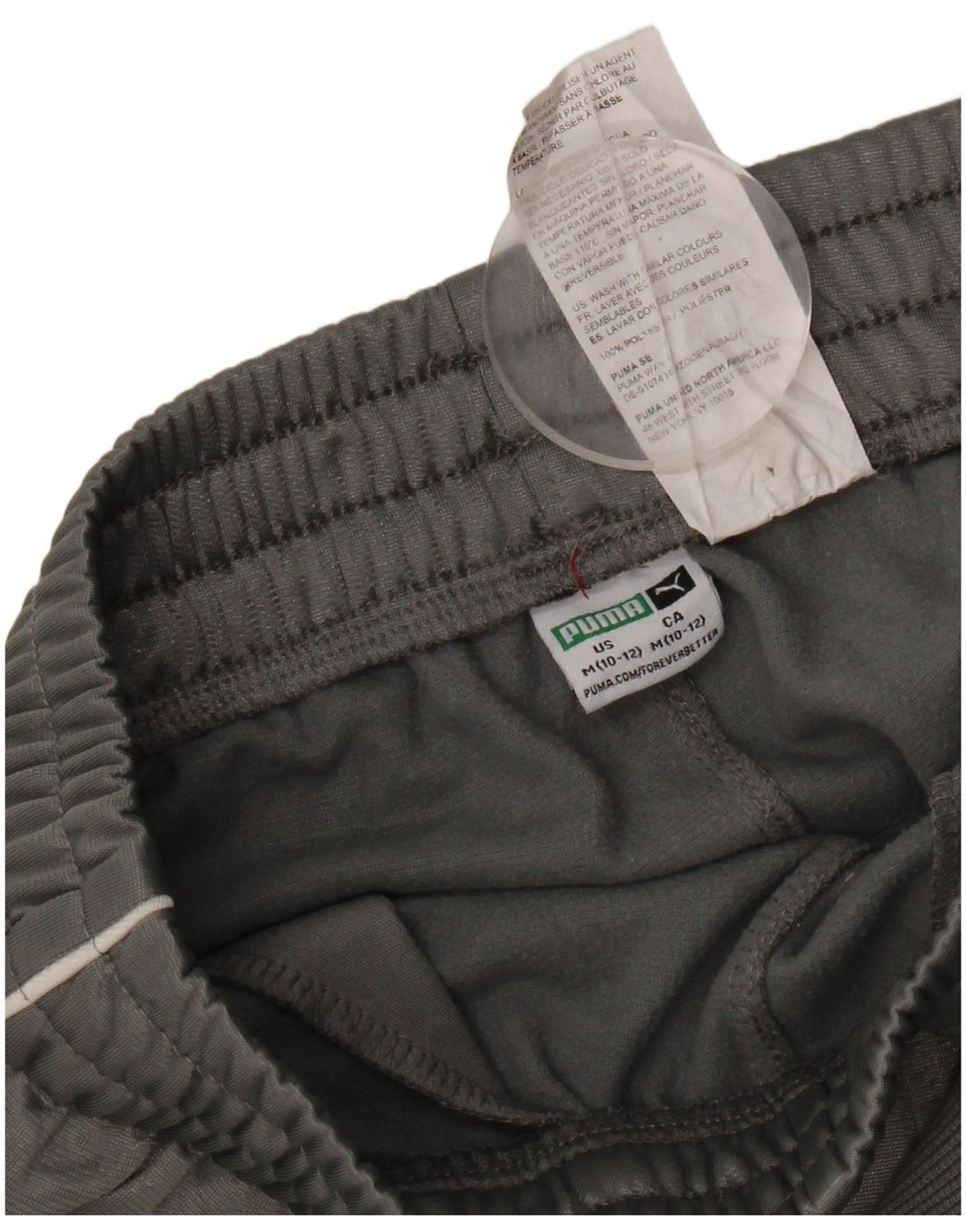 Calça de treino Puma Boys Graphic Joggers 10-11 anos cinza poliéster