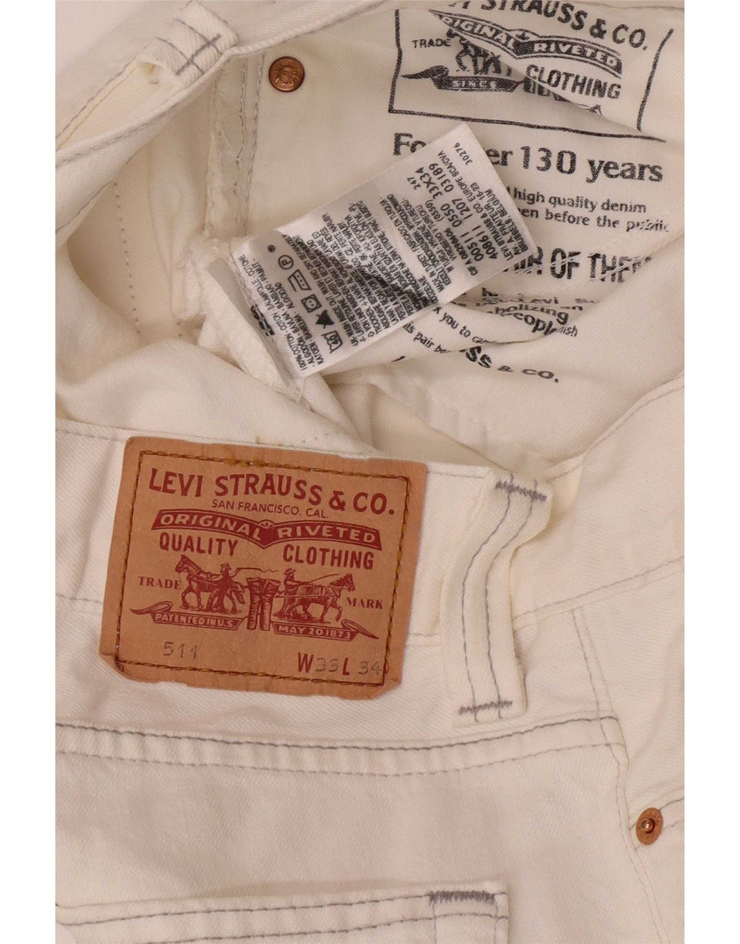 Calça jeans feminina Levi's 511 Slim W33 L34 algodão branco