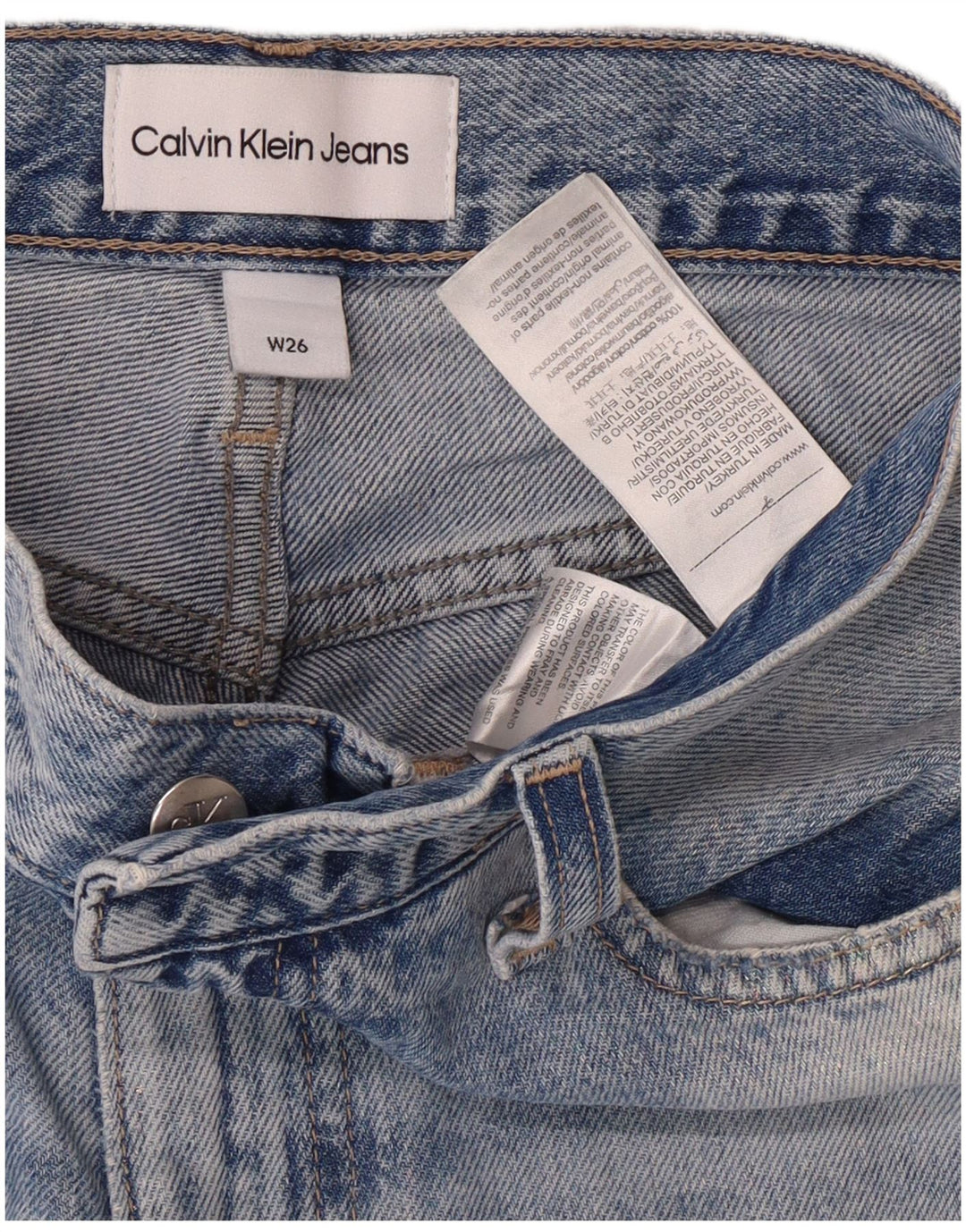 Calça jeans feminina Calvin Klein desgastada cônica cintura alta W26 L28 azul grunge
