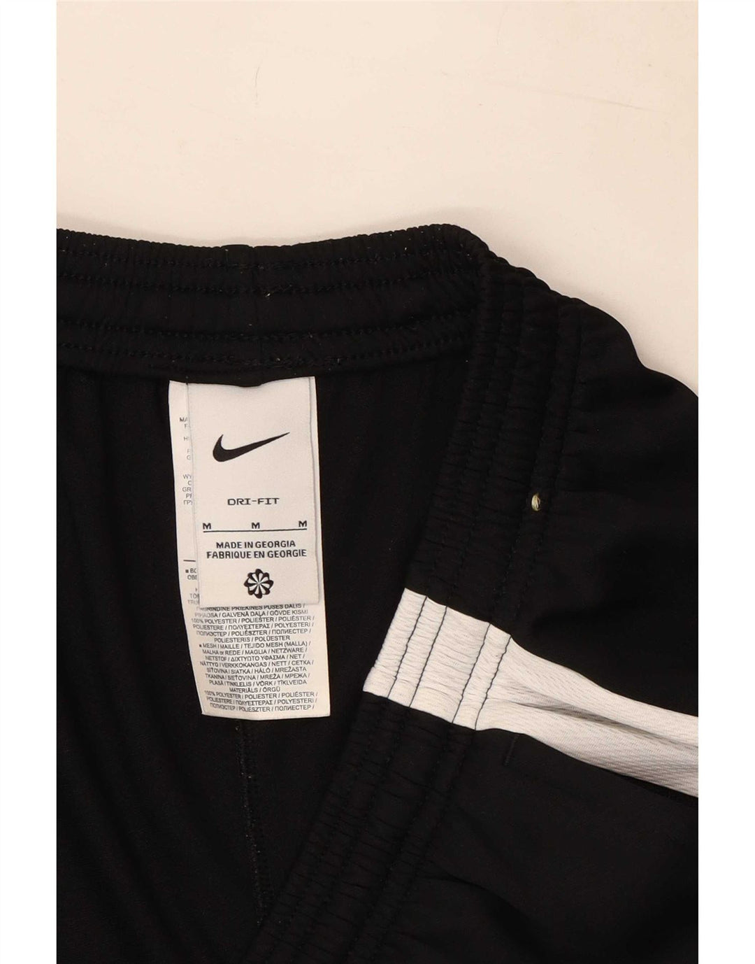 Calça de treino masculina Nike Dri Fit médio preto colorblock poliéster