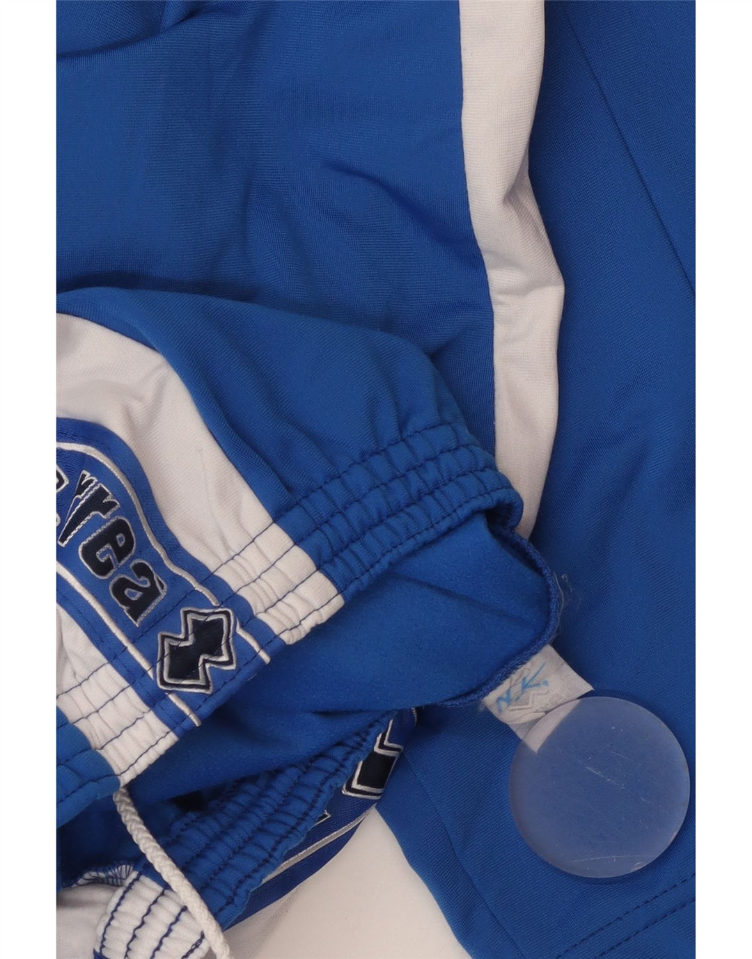 Calça de treino masculina Errea com estampa gráfica pequena azul colorblock