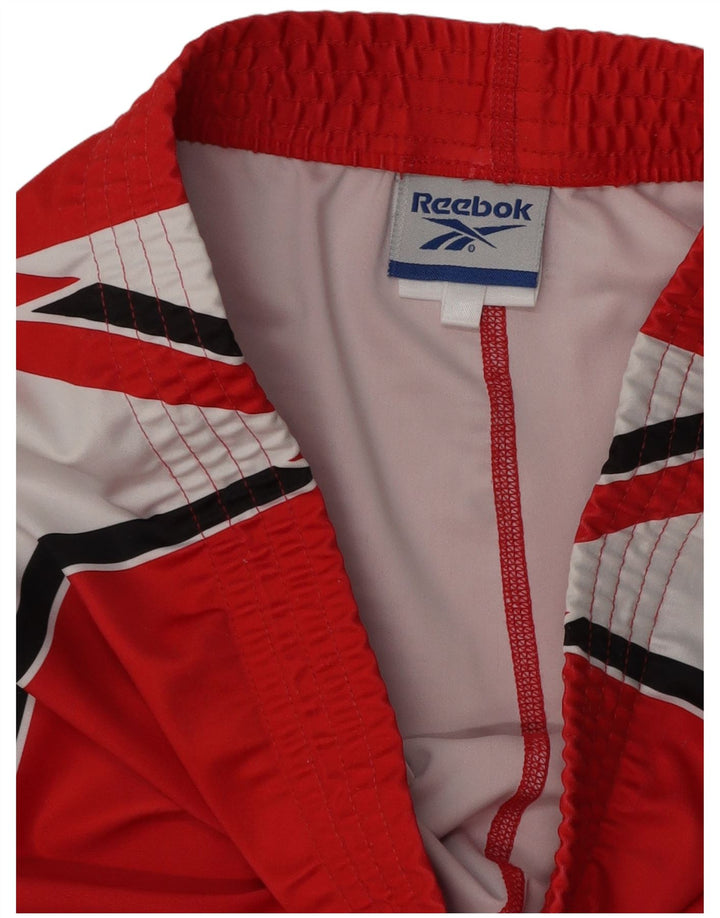 Reebok Mens Treino Calças Pequenas Poliéster Colorblock Vermelho
