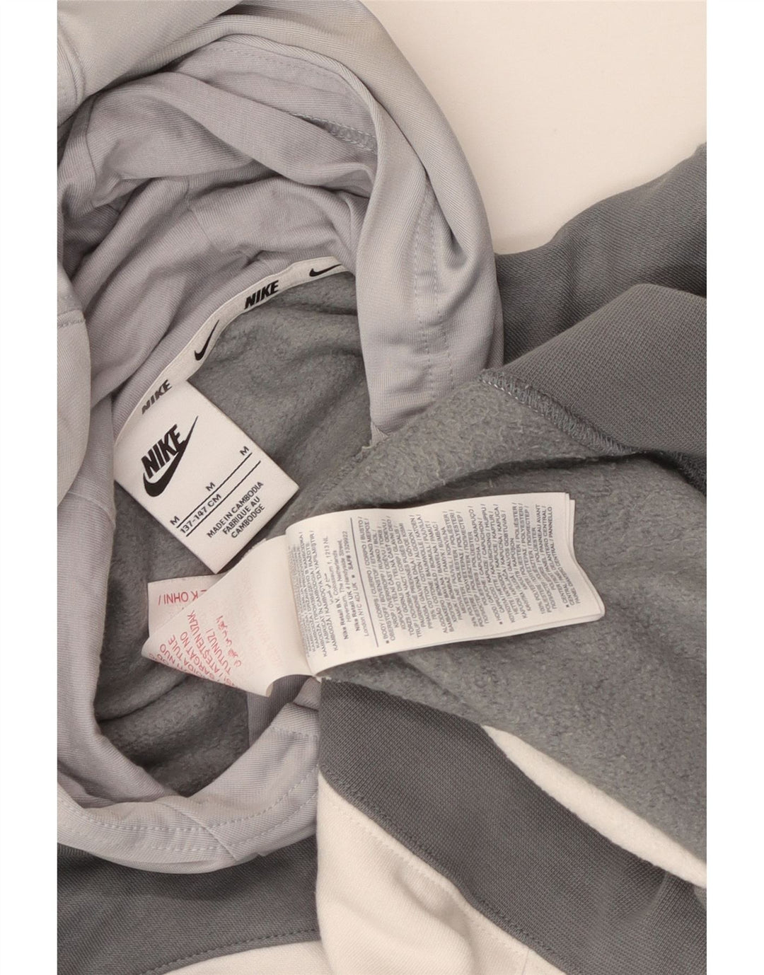 Suéter Nike Boys Graphic Zip com capuz 10-11 anos cinza médio bloco colorido