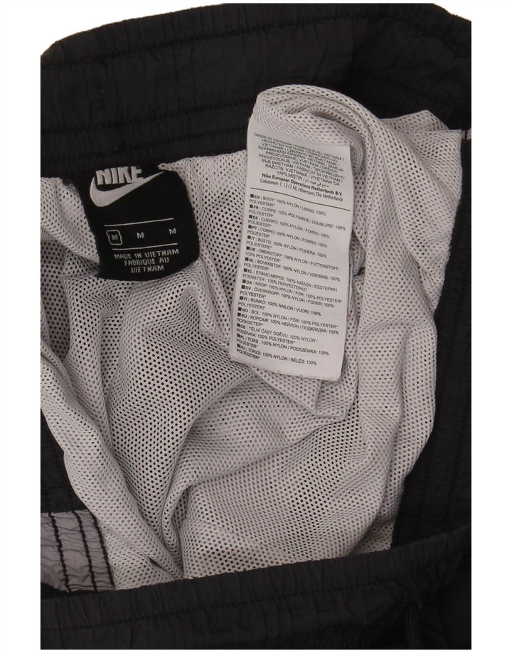 Calça de treino masculina Nike Joggers cinza médio colorblock poliamida