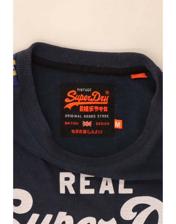 Camiseta gráfica masculina Superdry manga comprida médio azul marinho