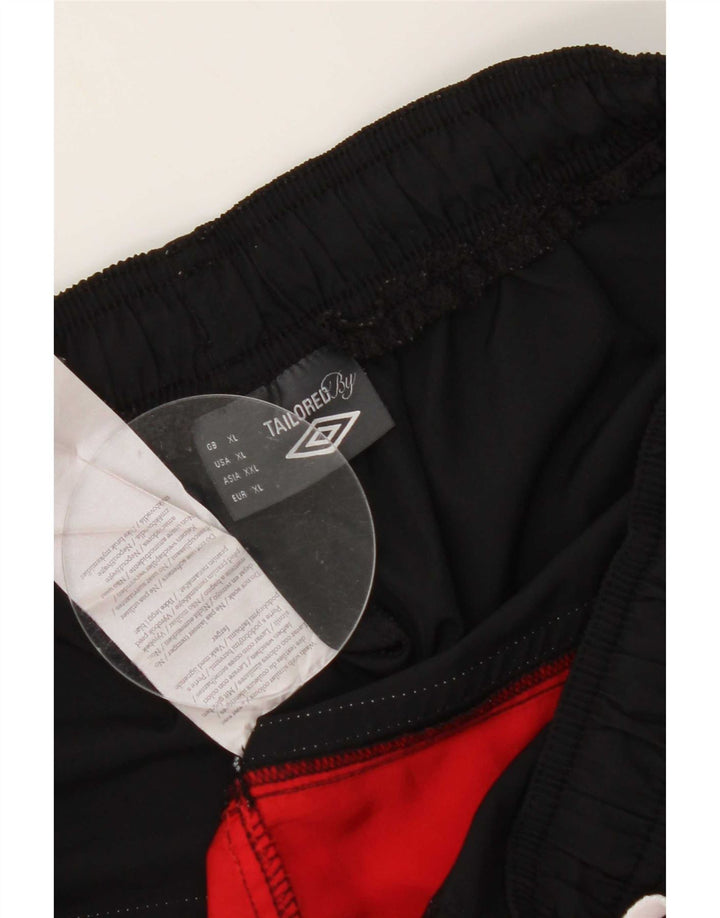 Shorts esportivo feminino Umbro XL vermelho colorblock poliéster