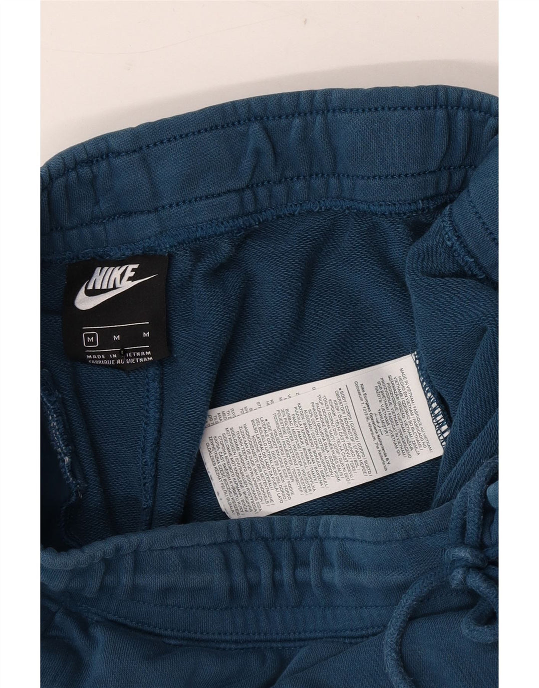 Nike Mens Beaverton Graphic Calças de treino Joggers Médio Azul Marinho