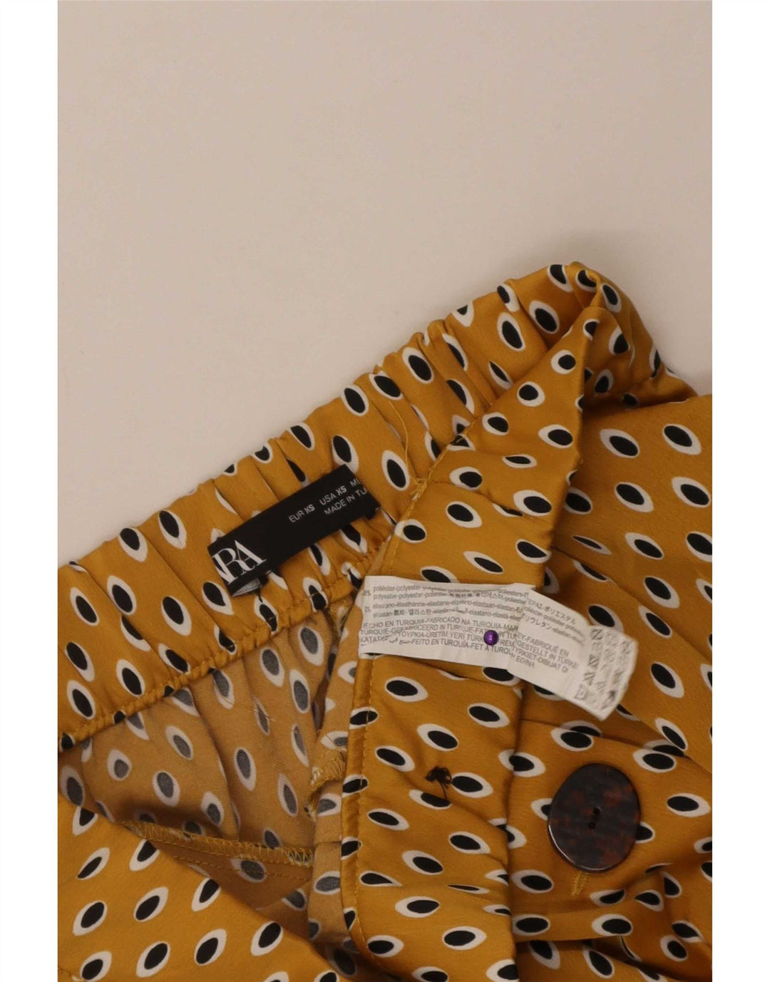 Calça capri feminina Zara XS W24 L21 poliéster manchado amarelo