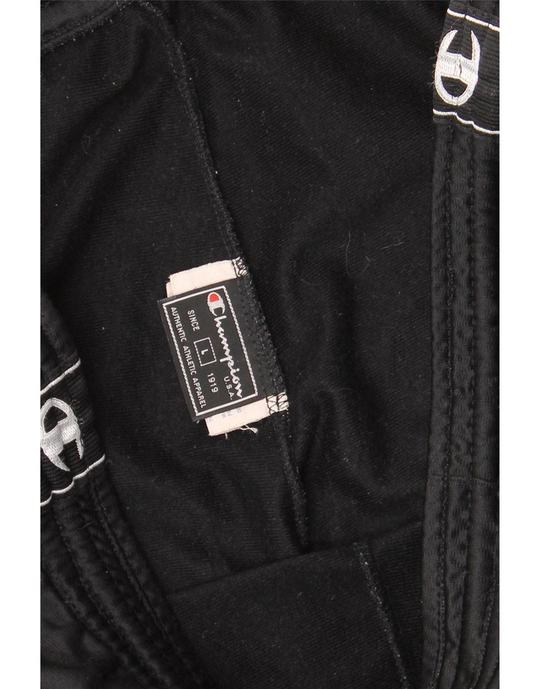 Calça esportiva masculina Champion com estampa gráfica grande de poliéster preto