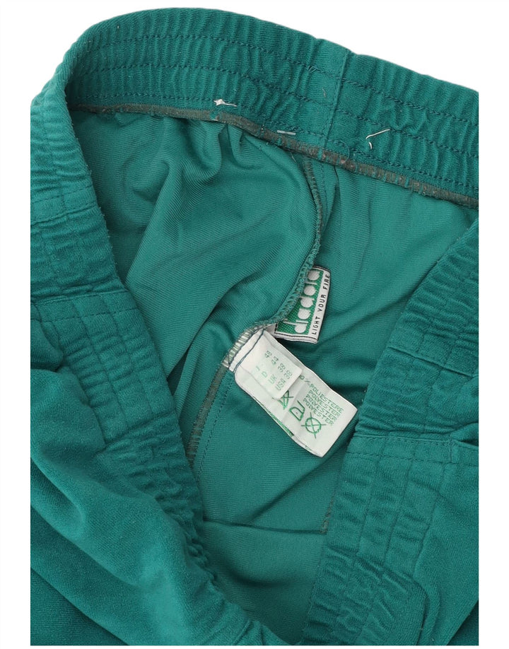 Calças de treino de veludo masculino Diadora UK 38 poliéster verde médio