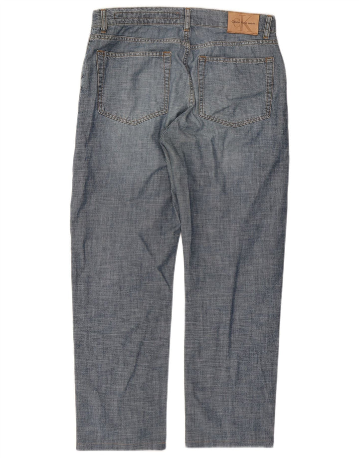 Calça jeans reta feminina Calvin Klein W32 L27 algodão azul