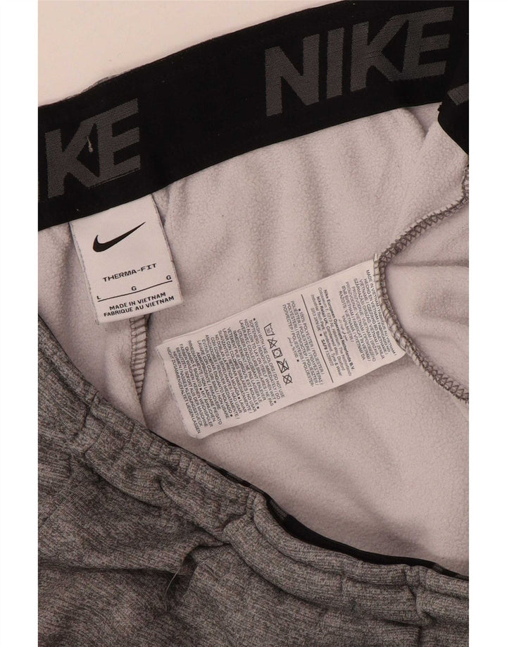 Calça esportiva masculina Nike Therma-Fit, calça jogger grande cinza poliéster