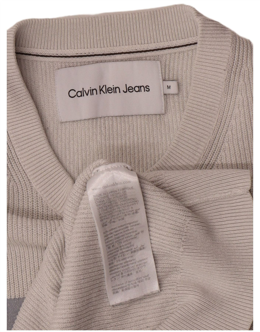 Suéter masculino Calvin Klein Jeans com gola redonda e bloco colorido cinza médio