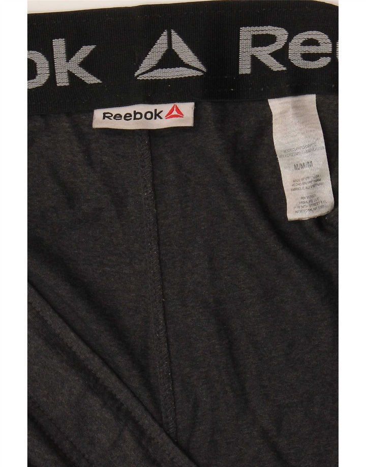 Shorts esportivos masculinos Reebok poliéster cinza médio