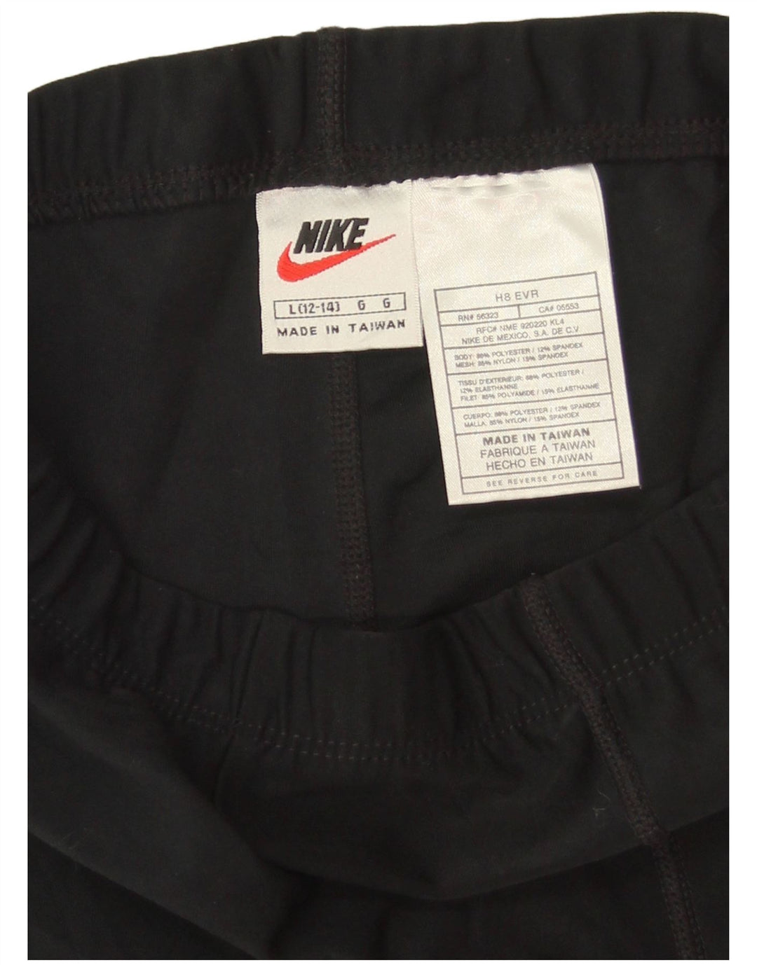 Shorts esportivos femininos NIKE EUA 12/14 grande poliéster preto