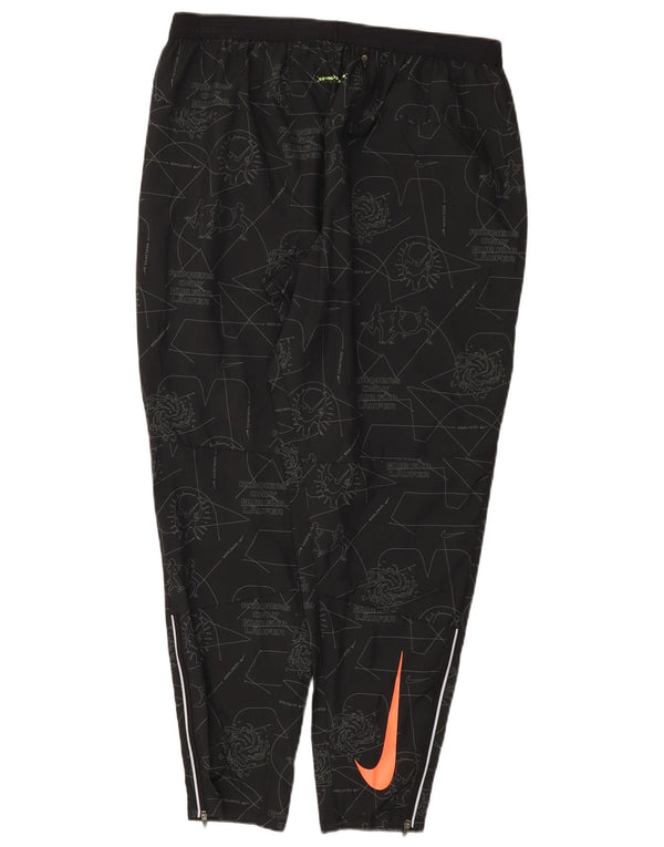 Calça de treino feminina Nike Dri Fit com padrão abstrato UK 18 XL preta