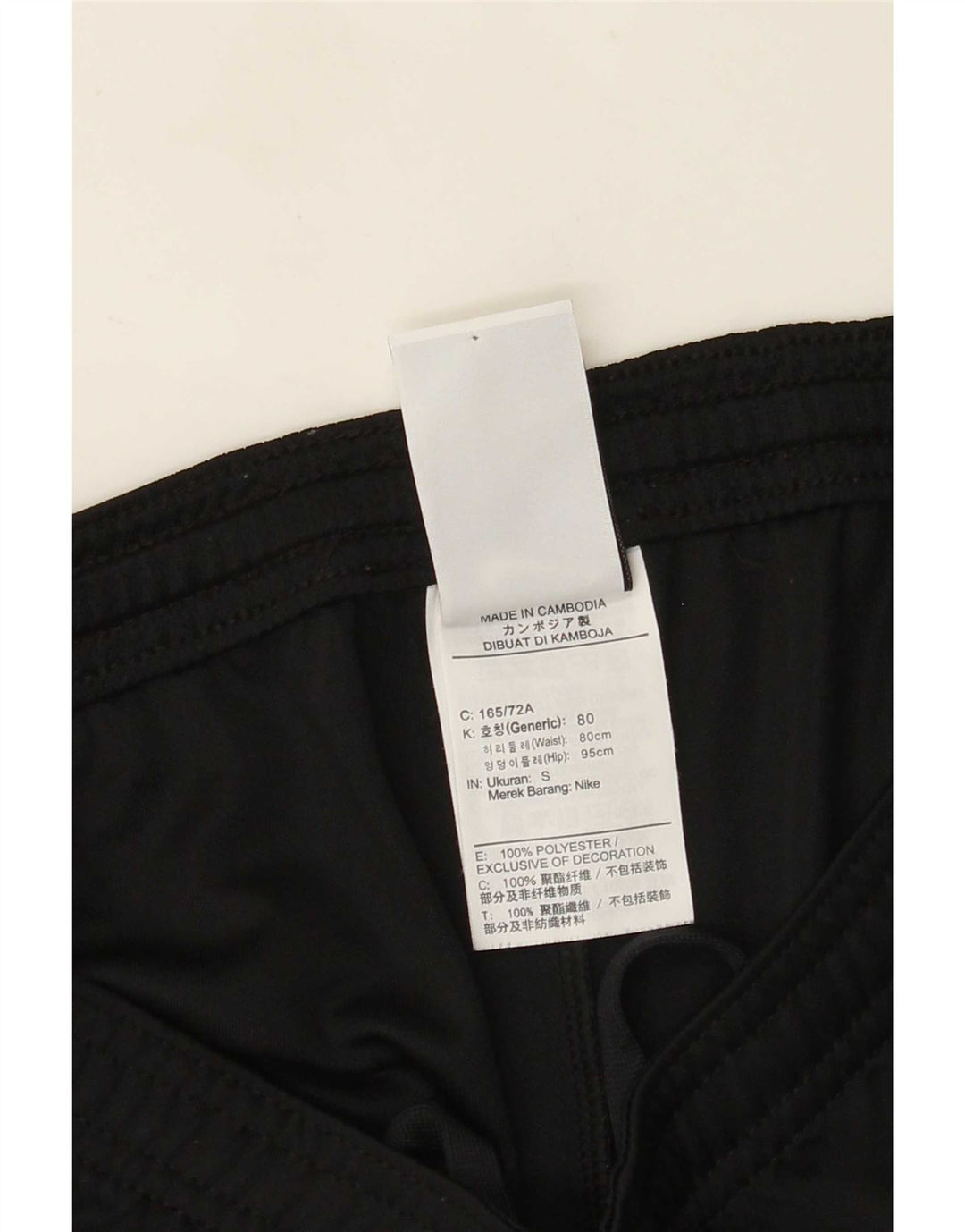 Shorts esportivos masculinos Nike Dri Fit pequenos pretos em poliéster colorblock